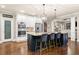 Beautiful kitchen with a large island, stainless steel appliances, and a convenient pantry provides both style and function at 903 Shaftoe Nw St, Kennesaw, GA 30152