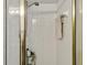 Bathroom shower stall with white tiled walls and a showerhead at 1649 Clairmont Ne Way, Brookhaven, GA 30329