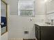 Bathroom with tile surround tub and updated vanity at 1649 Clairmont Ne Way, Brookhaven, GA 30329