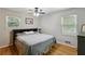 Well-lit bedroom with hardwood floors, ceiling fan, and modern design at 1649 Clairmont Ne Way, Brookhaven, GA 30329