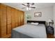 Bedroom with hardwood floors, closet with paneled doors and ceiling fan at 1649 Clairmont Ne Way, Brookhaven, GA 30329