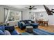 Bright and spacious living room featuring a large window and views to the dining room at 1649 Clairmont Ne Way, Brookhaven, GA 30329