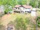 Home has a large backyard with deck and hot tub area perfect for relaxing and entertaining at 2619 Kellogg Creek Rd, Acworth, GA 30102
