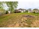 Expansive backyard featuring a deck and grassy area, perfect for outdoor activities and relaxation at 2619 Kellogg Creek Rd, Acworth, GA 30102