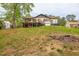 Expansive backyard featuring a deck and grassy area, perfect for outdoor activities and relaxation at 2619 Kellogg Creek Rd, Acworth, GA 30102