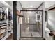 Stylish bathroom featuring modern shower and walk-in closet, offering a luxurious and functional space at 2619 Kellogg Creek Rd, Acworth, GA 30102