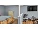 Bedroom with fitness area featuring a TV, bench, and weights, perfect for staying active at home at 2619 Kellogg Creek Rd, Acworth, GA 30102