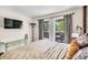 Bedroom with access to a private deck and a large window view at 2619 Kellogg Creek Rd, Acworth, GA 30102