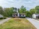 Beautiful home with inviting curb appeal featuring a well-manicured lawn and modern exterior features at 2619 Kellogg Creek Rd, Acworth, GA 30102