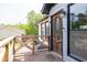 Inviting front porch with wood railing and charming front door at 2619 Kellogg Creek Rd, Acworth, GA 30102
