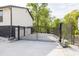 Gated driveway and garage featuring an automatic gate opener at 2619 Kellogg Creek Rd, Acworth, GA 30102