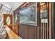 Hallway with eye-catching wood paneling and art at 2619 Kellogg Creek Rd, Acworth, GA 30102