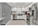 Kitchen featuring white cabinets, stainless steel appliances, and butcher block countertops at 2619 Kellogg Creek Rd, Acworth, GA 30102