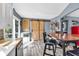 Bright kitchen features stainless steel appliances, white cabinetry, butcher block counters and large pantry at 2619 Kellogg Creek Rd, Acworth, GA 30102