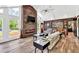 Bright and modern living room with vaulted ceilings, fireplace, and natural light at 2619 Kellogg Creek Rd, Acworth, GA 30102