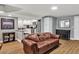 Open concept living room with modern finishes and partial kitchen view at 2619 Kellogg Creek Rd, Acworth, GA 30102