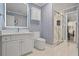 Stylish bathroom featuring a marble shower and sleek vanity with integrated lighting at 2990 Byrons Green Ct, Marietta, GA 30062