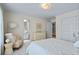 Bedroom featuring a sitting area and an open doorway to the bathroom at 2990 Byrons Green Ct, Marietta, GA 30062