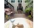 Charming courtyard with a stone fountain, lush greenery, and a decorative bird bath at 2990 Byrons Green Ct, Marietta, GA 30062