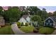 Charming home with well-kept lawn, mature trees, and a winding driveway at 2990 Byrons Green Ct, Marietta, GA 30062