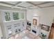 Bright living room with fireplace, large windows, and beautiful coffered ceiling at 2990 Byrons Green Ct, Marietta, GA 30062