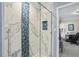 Close-up of the shower featuring designer tile and glass door at 2990 Byrons Green Ct, Marietta, GA 30062