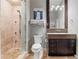 Modern bathroom with walk-in shower, dual vanity, and neutral tones to create a spa-like retreat at 943 Peachtree Ne St # 2002, Atlanta, GA 30309