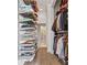Spacious walk-in closet with custom shelving and organization systems, perfect for ample storage at 943 Peachtree Ne St # 2002, Atlanta, GA 30309