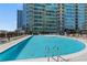 Resort-style pool with ample lounge chairs offers a refreshing escape for residents at 943 Peachtree Ne St # 2002, Atlanta, GA 30309