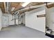 Unfinished basement features exposed piping, utility and a shower at 2009 Shipwreck Ct, Buford, GA 30518