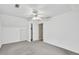Bonus room with neutral color scheme, attic access, and closet storage at 2009 Shipwreck Ct, Buford, GA 30518