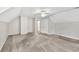 Bonus room with neutral color scheme, attic access, and closet storage at 2009 Shipwreck Ct, Buford, GA 30518