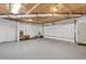 Spacious garage with epoxy flooring. Garage door to backyard at 2009 Shipwreck Ct, Buford, GA 30518
