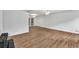Spacious living room features wood floors and a ceiling fan at 2009 Shipwreck Ct, Buford, GA 30518