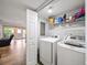 Bright laundry room with modern washer and dryer at 2102 Palmyra Se Dr, Marietta, GA 30067