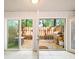 Back patio with backyard view featuring a gas grill and bench at 2102 Palmyra Se Dr, Marietta, GA 30067