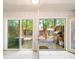 Back patio with backyard view featuring a gas grill and bench at 2102 Palmyra Se Dr, Marietta, GA 30067