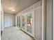Sun room with tile flooring and sliding glass doors to backyard at 2102 Palmyra Se Dr, Marietta, GA 30067