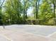 Outdoor tennis court perfect for getting in a game or practicing your tennis swing at 2102 Palmyra Se Dr, Marietta, GA 30067