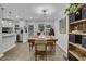 Stylish dining room with modern lighting and seamless flow to the kitchen at 4128 Boxwood Way, Duluth, GA 30096