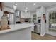 Well-lit kitchen with stainless steel appliances and ample counter space at 4128 Boxwood Way, Duluth, GA 30096