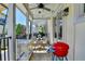 Cozy balcony with string lights, grill, and outdoor dining set at 6065 Cushing Cir, Norcross, GA 30071