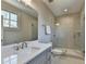 Contemporary bathroom featuring a vanity with a white countertop and frameless glass shower at 6065 Cushing Cir, Norcross, GA 30071