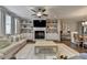 Bright and spacious living room with hardwood floors, a fireplace, and stylish furniture at 6065 Cushing Cir, Norcross, GA 30071