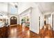 Elegant foyer boasts hardwood floors, tall ceilings, and a view of the formal dining area at 841 Camden Park Ne Ct, Atlanta, GA 30342