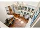 Grand foyer with hardwood floors, chandelier, staircase, and lots of windows at 841 Camden Park Ne Ct, Atlanta, GA 30342