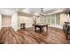 Bright game room features a pool table, bar, hardwood floors and plenty of natural light at 841 Camden Park Ne Ct, Atlanta, GA 30342