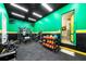 Home gym equipped with weights, exercise equipment, and rubber flooring at 841 Camden Park Ne Ct, Atlanta, GA 30342