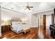 Spacious primary bedroom with hardwood floors and ensuite bathroom access at 841 Camden Park Ne Ct, Atlanta, GA 30342