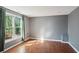 Bright bedroom with large windows, hardwood floors, and neutral walls create a peaceful and inviting atmosphere at 900 Crossfire Nw Rdg, Marietta, GA 30064